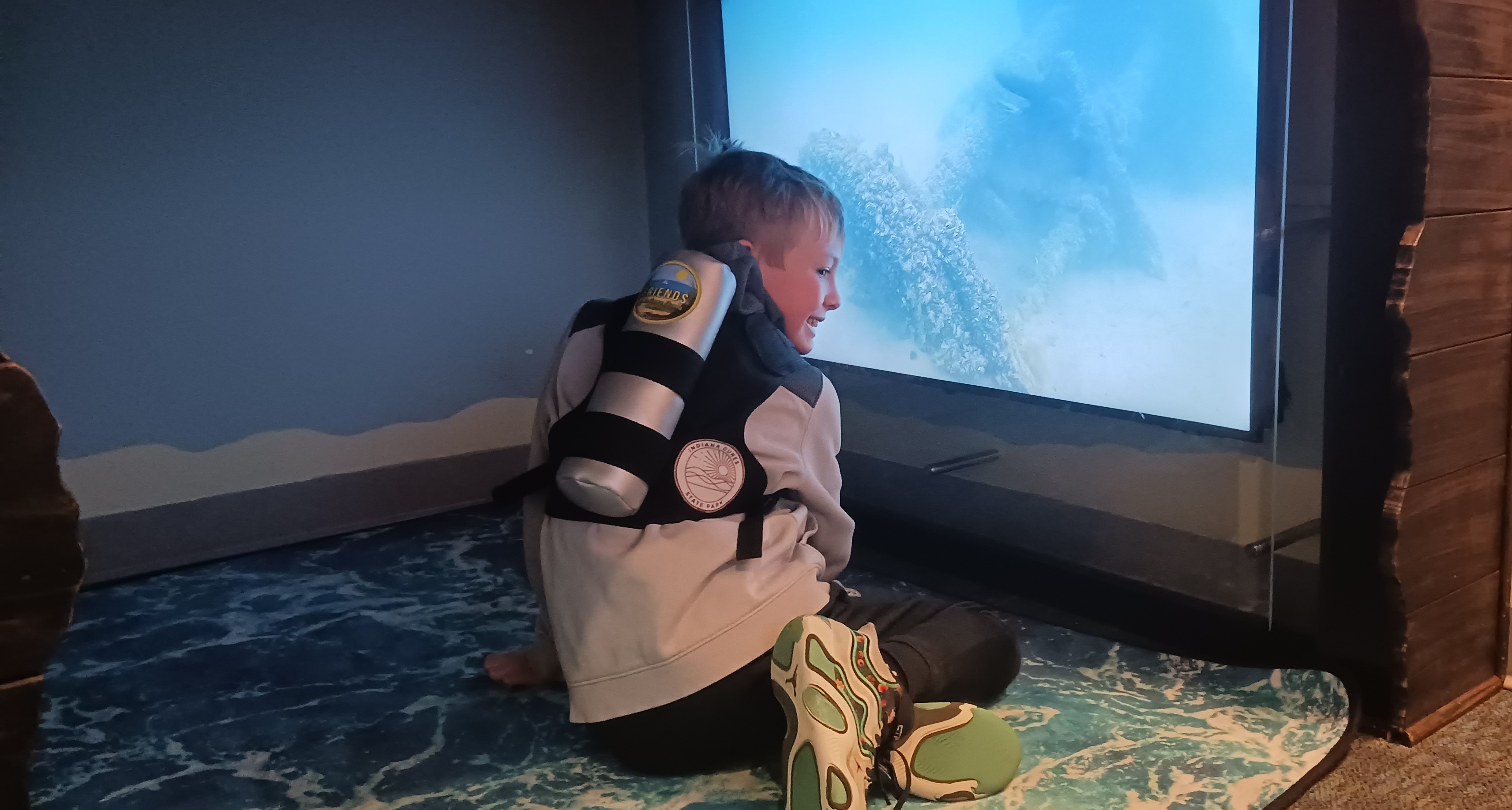 child with FOID scuba tank
